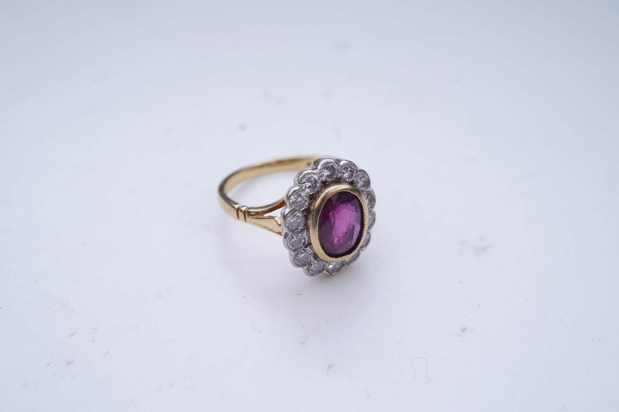 A ruby and diamond cluster ring